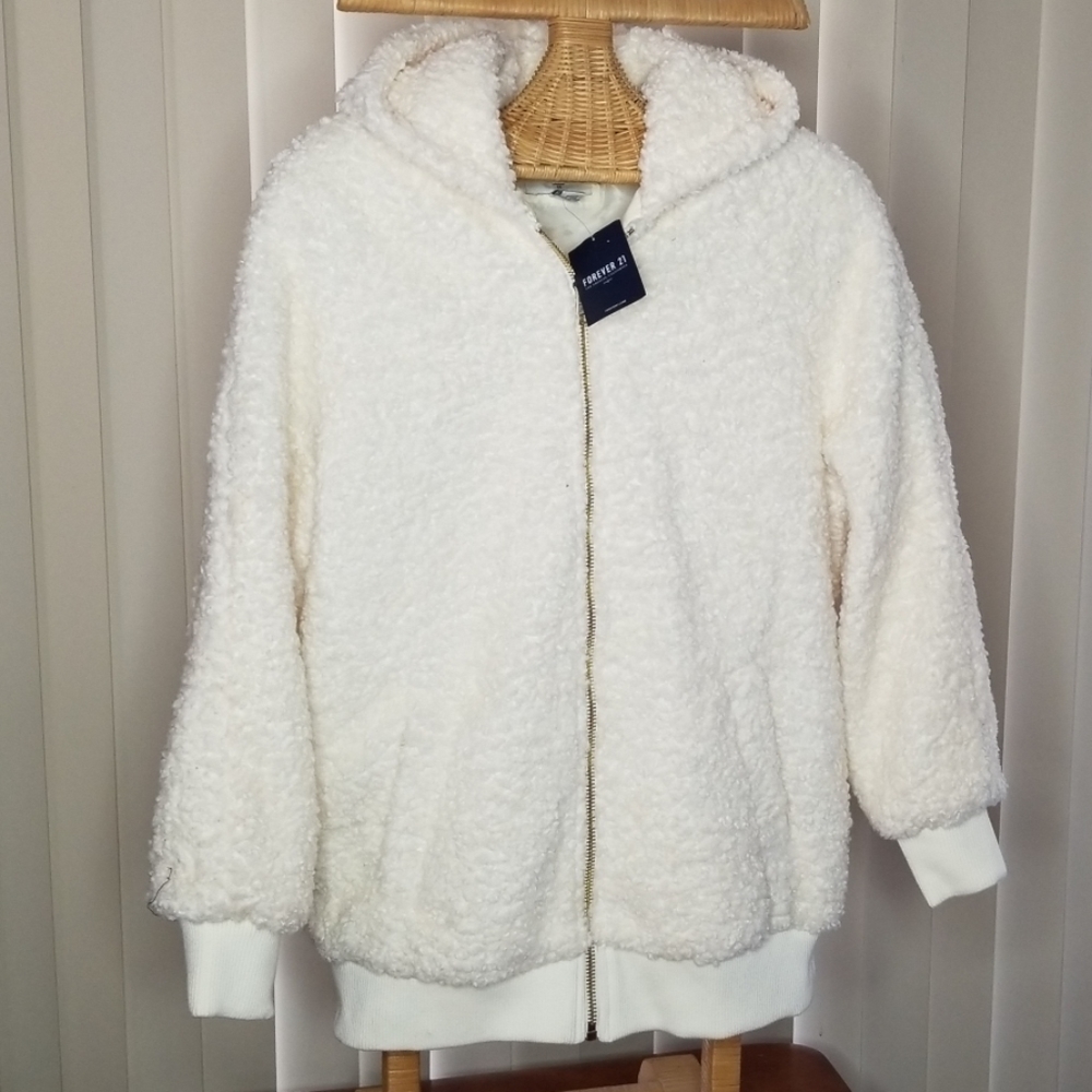 Large Outerwear Jacket . Cream in color. Brand New